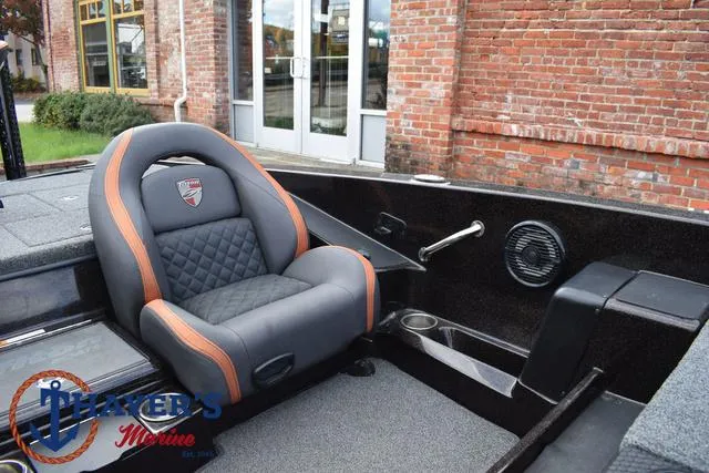 Slide: The Image of 2020 Triton 20 TRX Patriot boat interior with premium seating and sleek design. - 24