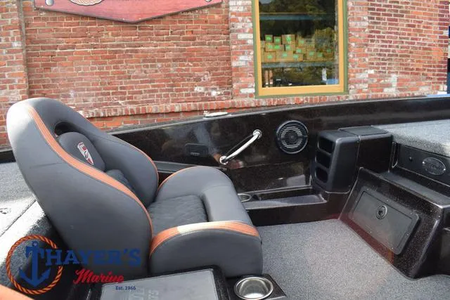 Slide: The Image of 2020 Triton 20 TRX Patriot boat interior with comfortable seating and modern design. - 25