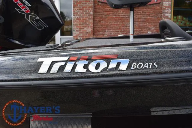 Slide: The Image of 2020 Triton 20 TRX Patriot boat with logo, displayed at Thayer's Marine. - 5
