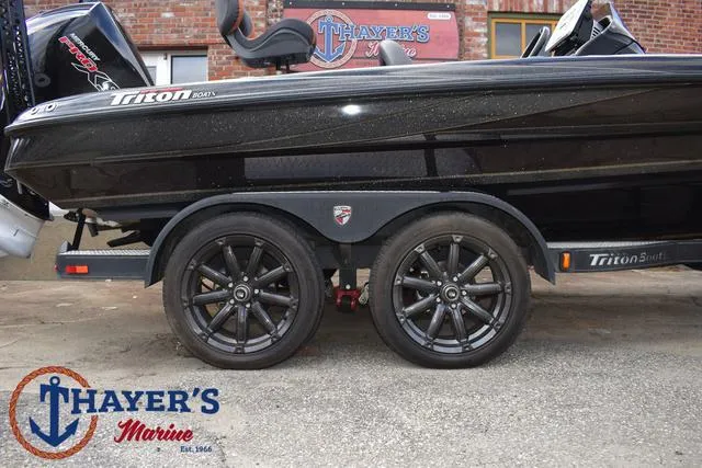 Slide: The Image of 2020 Triton 20 TRX Patriot boat on trailer at Thayer's Marine. - 7