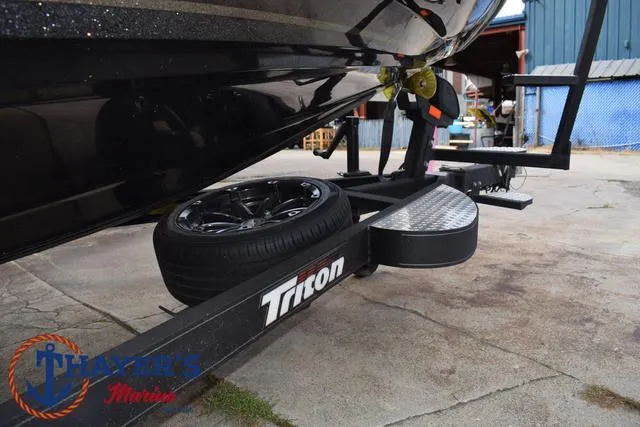 Slide: The Image of 2020 Triton 20 TRX Patriot boat trailer with spare tire at Thayer's Marine. - 8
