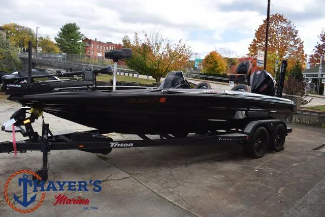 Slide: The Image of 2020 Triton 20 TRX Patriot boat on trailer at Thayer's Marine. - 9