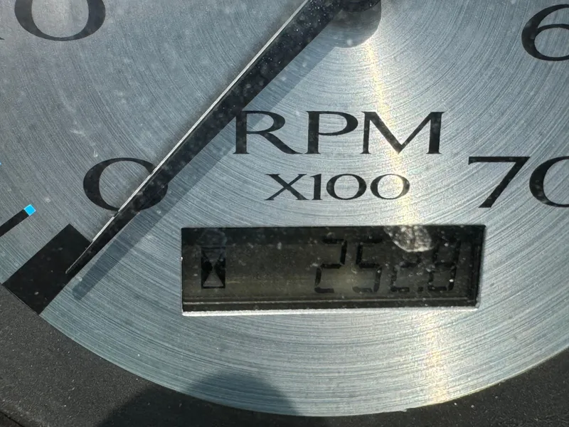 Slide: The Image of Close-up of a Bennington 24 SLX3 2014 RPM gauge displaying 2500 RPM. - 14