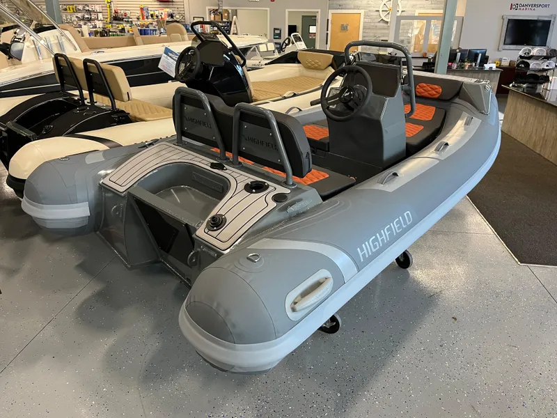Slide: The Image of 2024 Highfield Sport 360 inflatable boat displayed in showroom. - 5