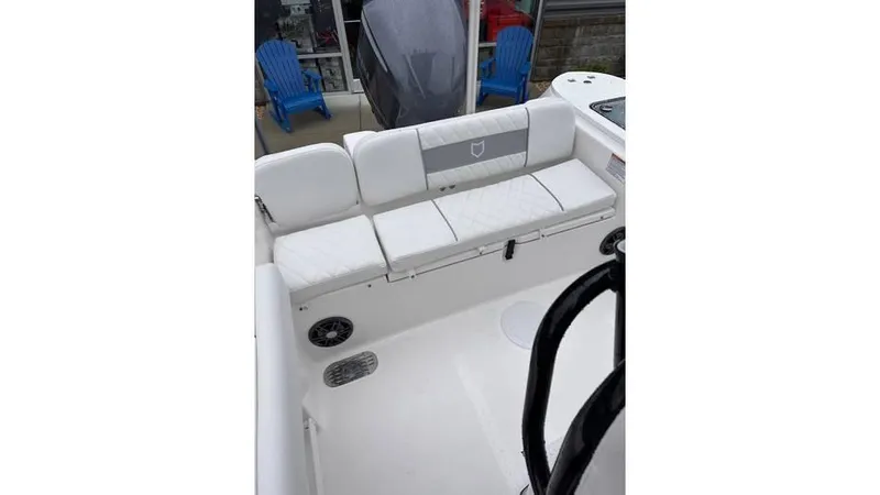 Slide: The Image of 2025 Sea Fox 248 Commander boat interior with white seating and modern design. - 18