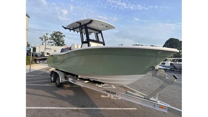Slide: The Image of 2025 Sea Fox 248 Commander boat on trailer in parking lot. - 2