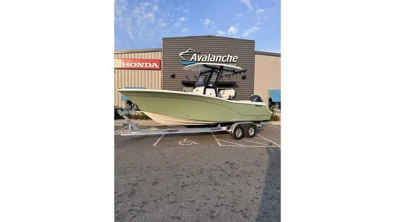 Slide: The Image of 2025 Sea Fox 248 Commander boat on trailer outside Avalanche dealership. - 4