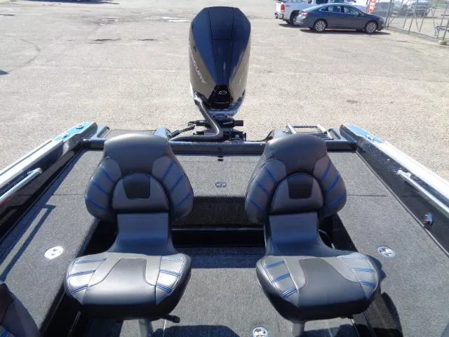 Slide: The Image of 2024 Nitro ZV20 Pro boat interior with dual seats and motor. - 4