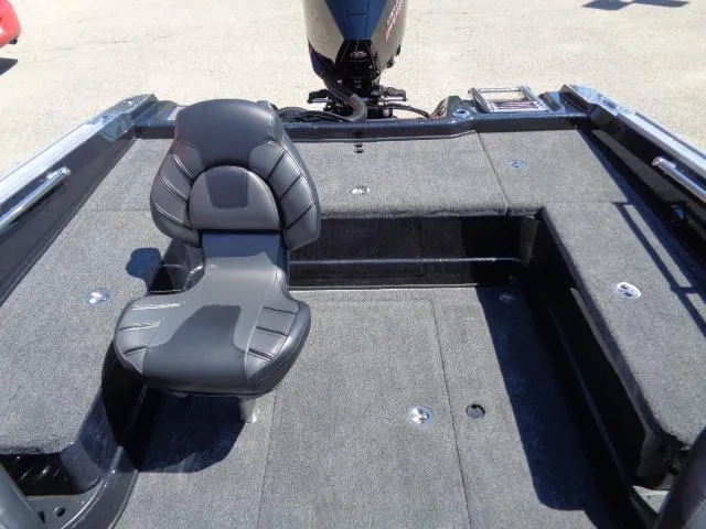 Slide: The Image of 2024 Nitro ZV20 boat interior with cushioned seat and spacious deck. - 5