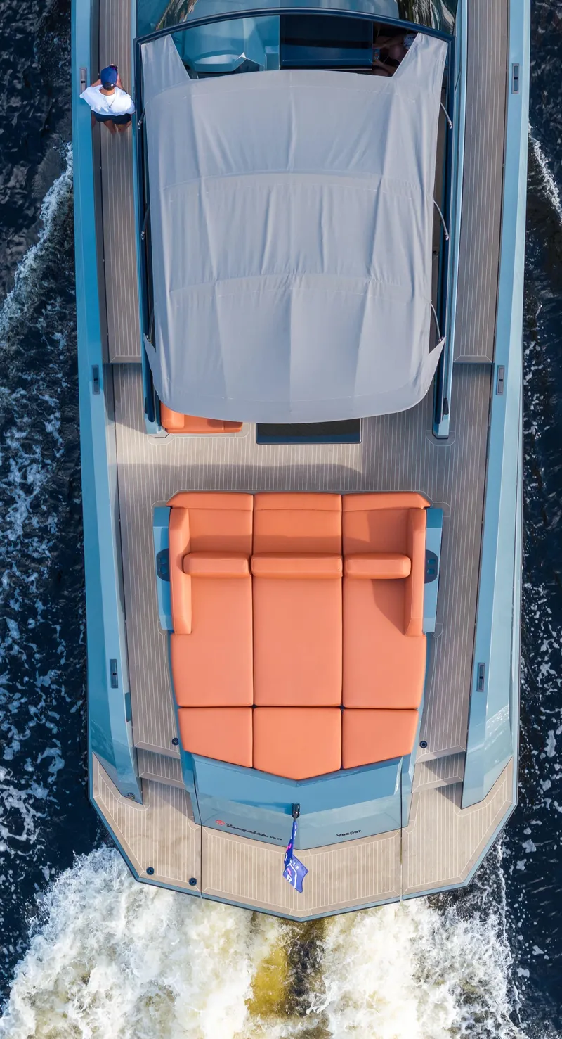 Slide: The Image of Top view of 2017 Vanquish Yachts VQ 54 luxury yacht cruising on water. - 25