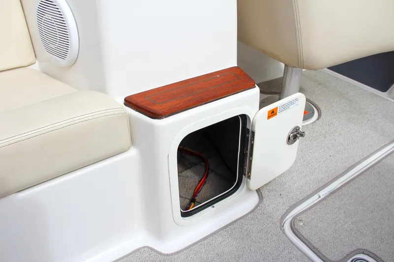 Slide: The Image of Open storage compartment on 2004 Chris-Craft Launch 25 boat interior. - 15