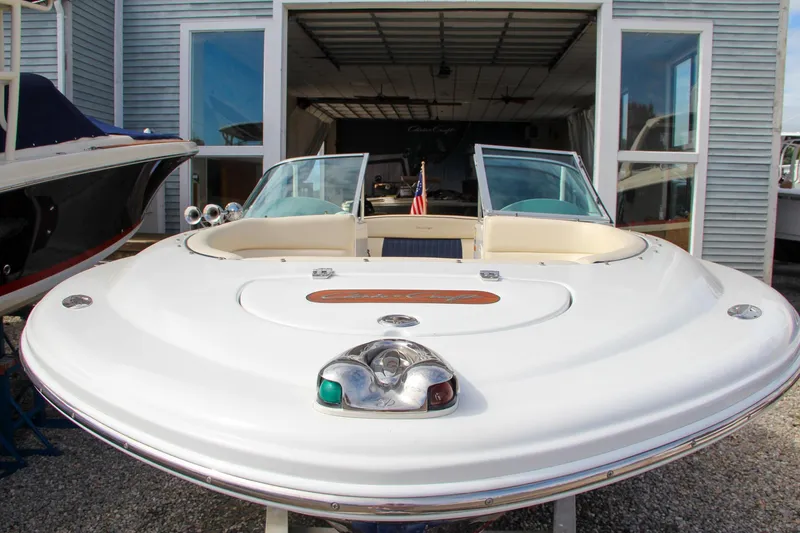 Slide: The Image of 2004 Chris-Craft Launch 25 boat in storage, front view. - 41