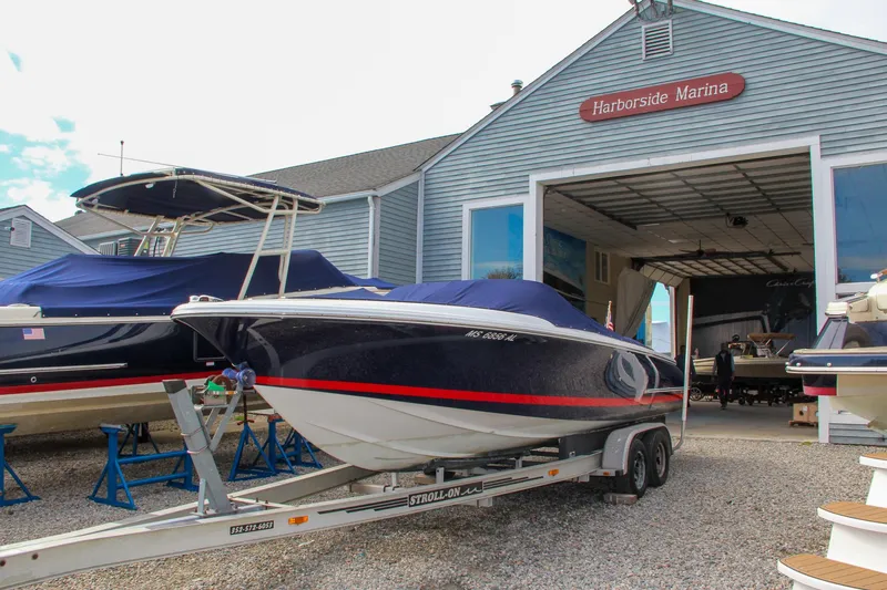Slide: The Image of 2004 Chris-Craft Launch 25 boat on trailer at Harborside Marina. - 8