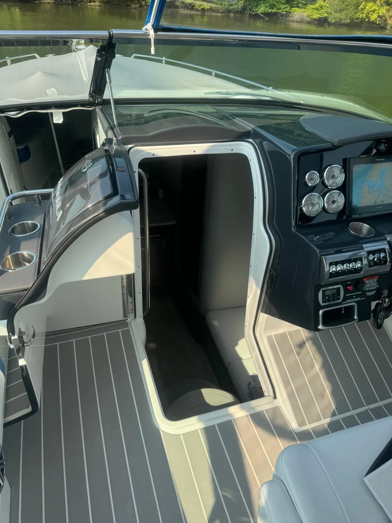 Slide: The Image of 2020 Formula 350 Crossover Bowrider cockpit with modern controls and sleek design. - 11