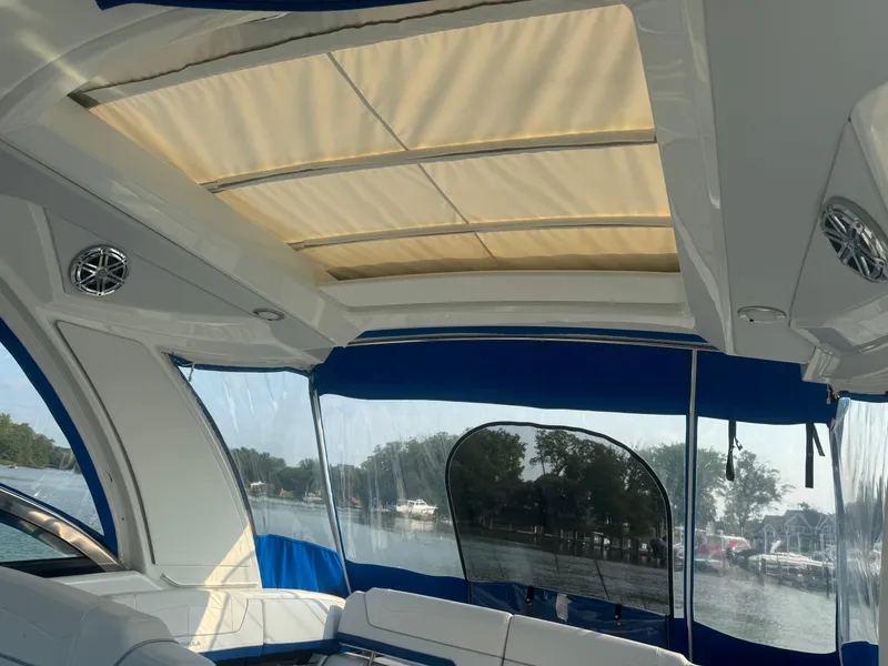 Slide: The Image of Interior view of 2020 Formula 350 Crossover Bowrider with sunroof and seating. - 16