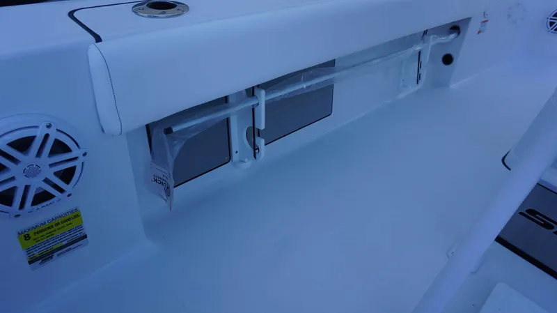 Slide: The Image of 2025 Sportsman 227 MASTERS boat interior with speaker and storage compartment. - 20