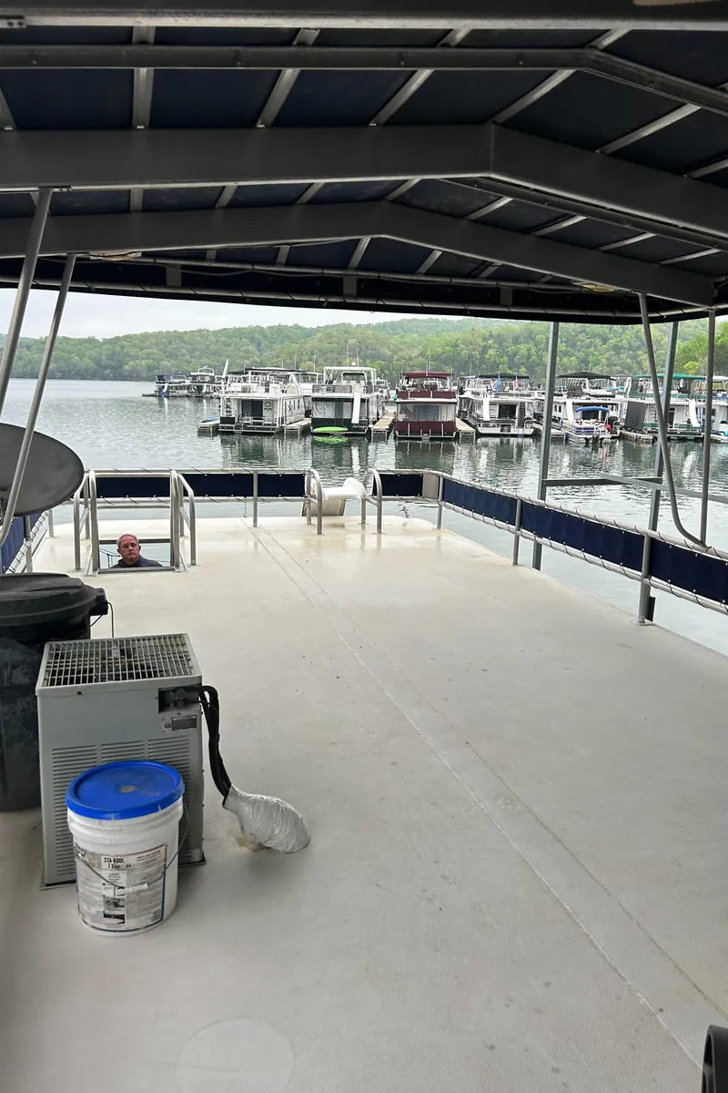 Slide: The Image of 1988 Waterhouse houseboat with catwalks, spacious deck, overlooking marina and lake. - 9