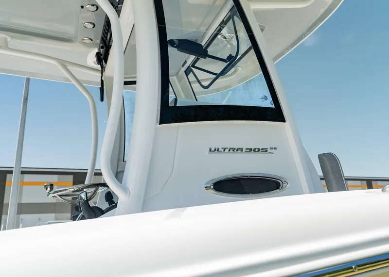 Slide: The Image of 2025 Sea Hunt Ultra 305 SE boat console with sleek design and modern features. - 5