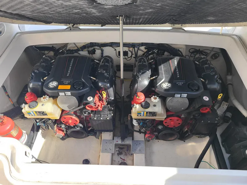 Slide: The Image of Twin engines in a 2016 Chaparral 307 SSX boat engine compartment. - 21