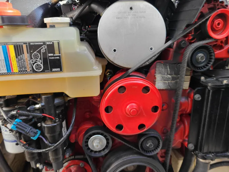 Slide: The Image of Engine components of a 2016 Chaparral 307 SSX, featuring belts and pulleys. - 24