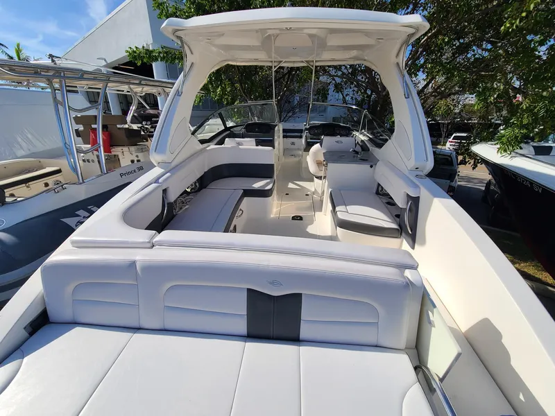 Slide: The Image of 2016 Chaparral 307 SSX boat with spacious seating and sleek design. - 9