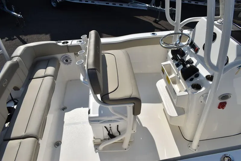 Slide: The Image of 2024 Key West 203 FS boat interior with seating and console. - 12