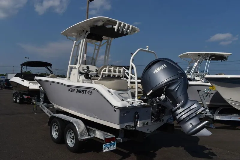 Slide: The Image of 2024 Key West 203 FS boat with Yamaha engine on trailer. - 4