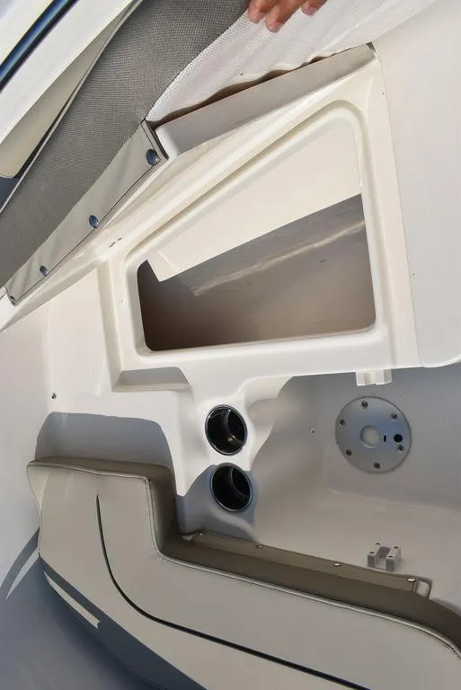 Slide: The Image of 2024 Key West 203 FS boat interior storage compartment and seating detail. - 44