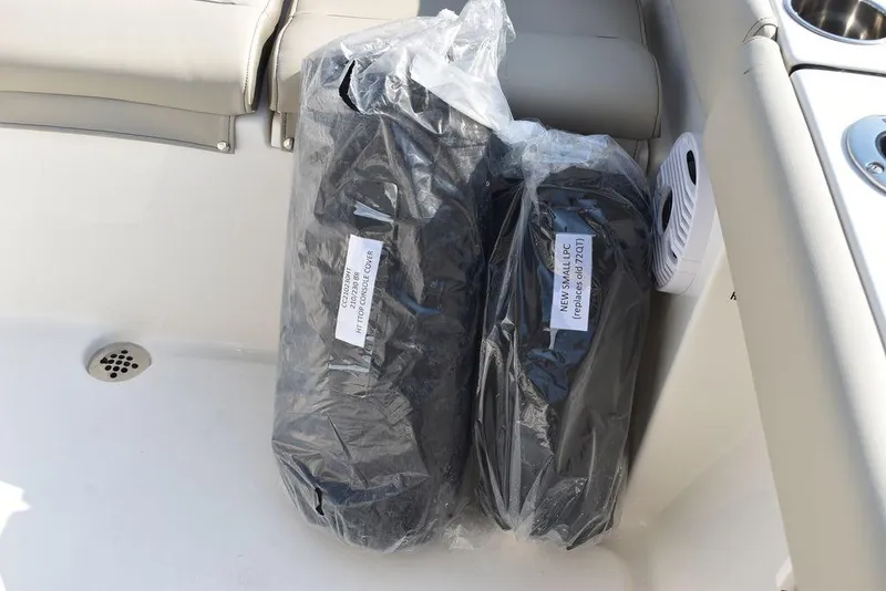 Slide: The Image of 2024 Key West 203 FS boat interior with packaged accessories. - 47