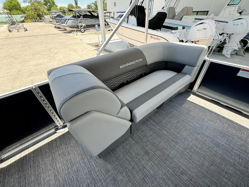 Slide: The Image of 2025 Bennington 22ss-sps pontoon boat with sleek gray seating. - 20