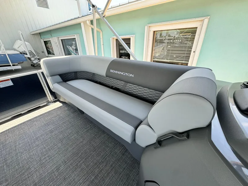 Slide: The Image of 2025 Bennington 22ss-sps pontoon boat interior with gray seating. - 21