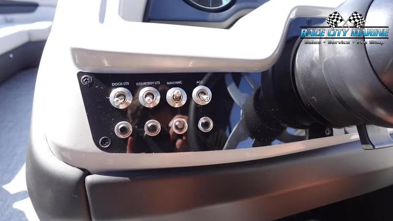 Slide: The Image of Control panel of 2025 Barletta C24UC boat with labeled switches. - 16