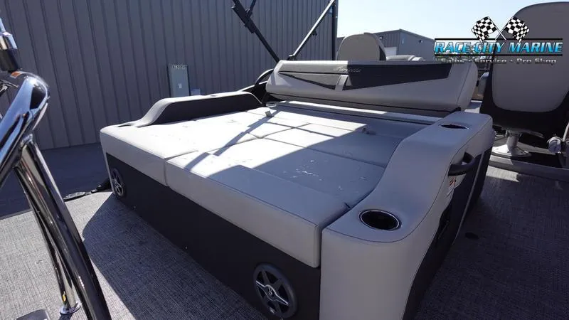 Slide: The Image of 2025 Barletta C24UC pontoon boat with spacious seating and modern design. - 19