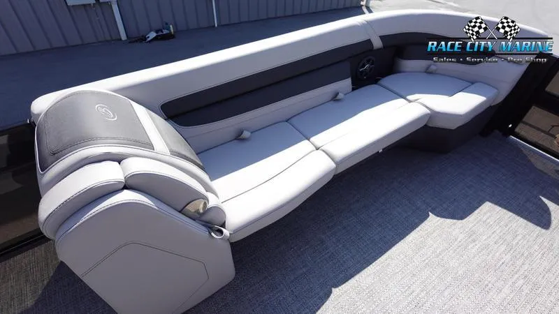Slide: The Image of 2025 Barletta C24UC boat interior with sleek, modern seating design. - 26