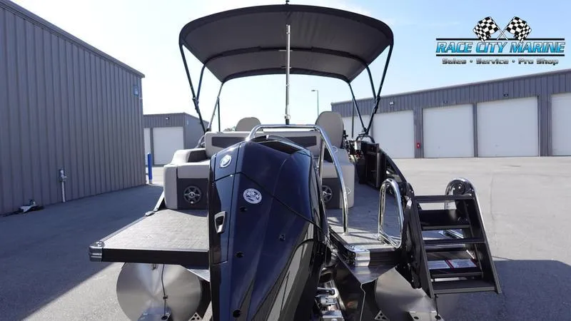 Slide: The Image of 2025 Barletta C24UC pontoon boat with canopy at Race City Marine. - 3