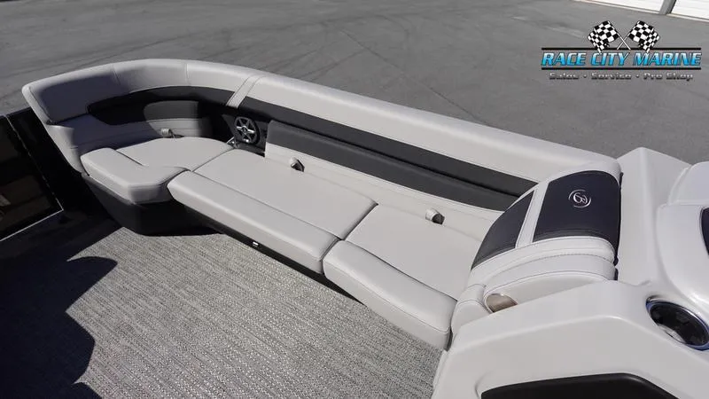 Slide: The Image of 2025 Barletta C24UC boat interior with sleek gray seating and modern design. - 35