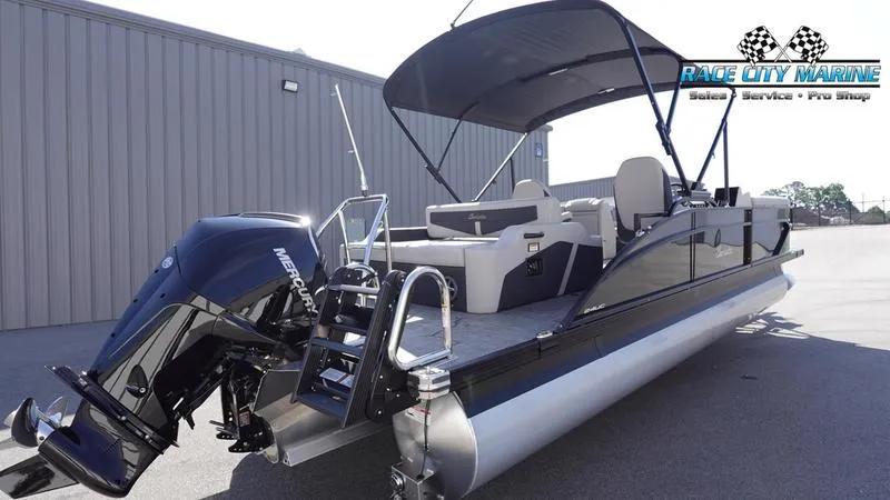 Slide: The Image of 2025 Barletta C24UC pontoon boat with Mercury outboard motor at Race City Marine. - 4
