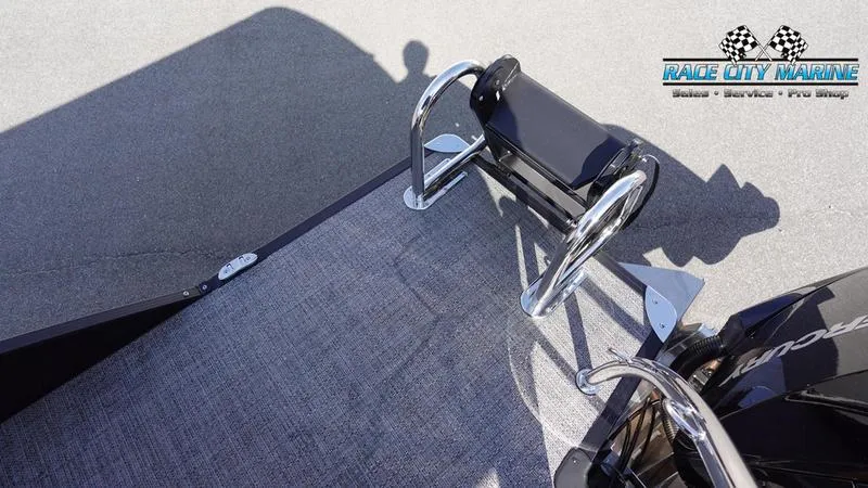 Slide: The Image of 2025 Barletta C24UC boat with Race City Marine logo, featuring sleek chrome details. - 8