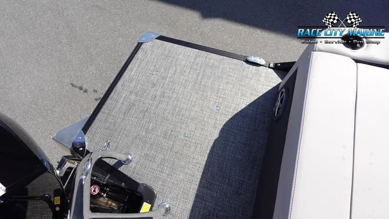 Slide: The Image of Barletta C24UC 2025 boat deck with motor, Race City Marine logo visible. - 9