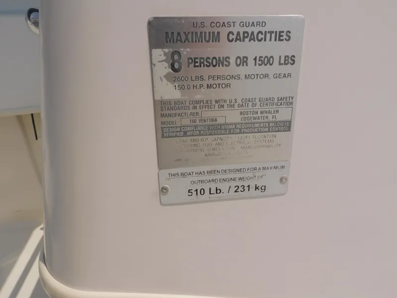 Slide: The Image of Capacity plate on 2004 Boston Whaler Ventura 180, max 8 persons or 1500 lbs. - 32
