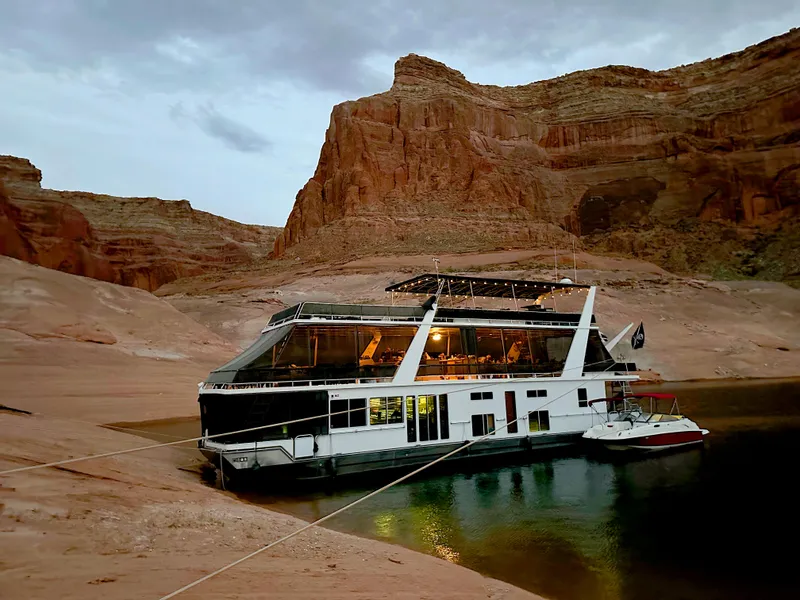 Slide: The Image of Houseboat "Endless Summer" docked in scenic canyon, 2001 model. - 13