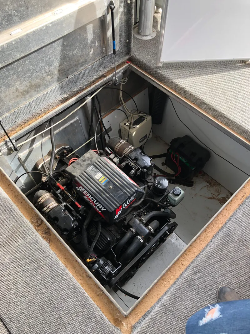 Slide: The Image of Boat engine compartment with Mercury motor, Custom Endless Summer 2001 model. - 2