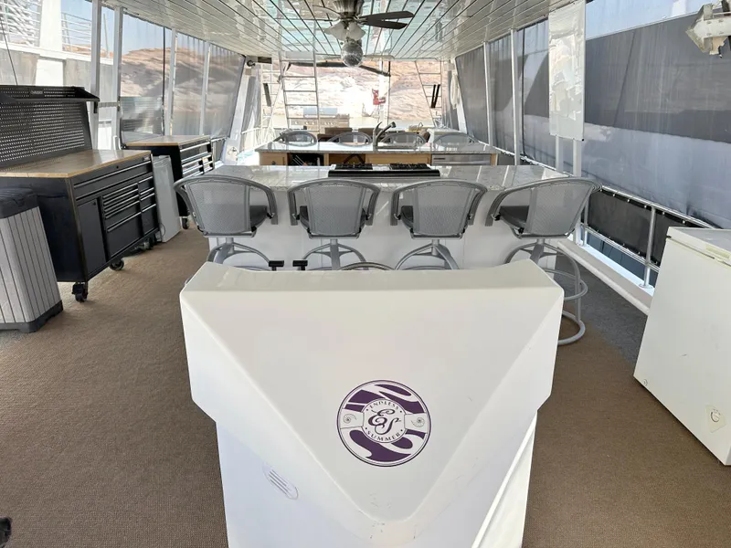 Slide: The Image of Spacious boat interior with bar seating, Custom Endless Summer 2001 model. - 24