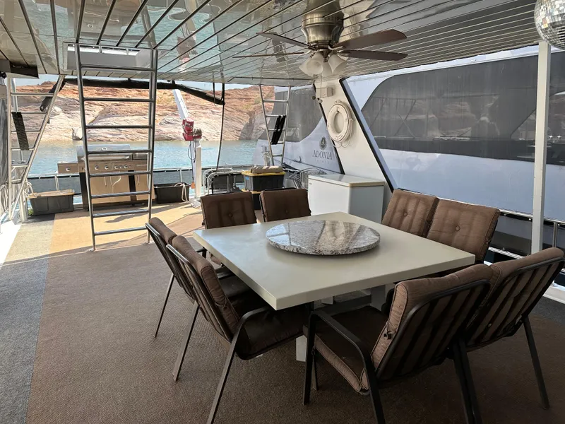 Slide: The Image of Luxury houseboat deck with dining area, Custom Endless Summer 2001, scenic lake view. - 25