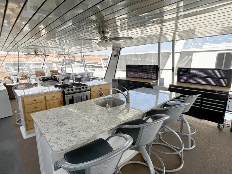 Slide: The Image of Luxurious yacht interior with modern kitchen and seating, Custom Endless Summer 2001 model. - 27
