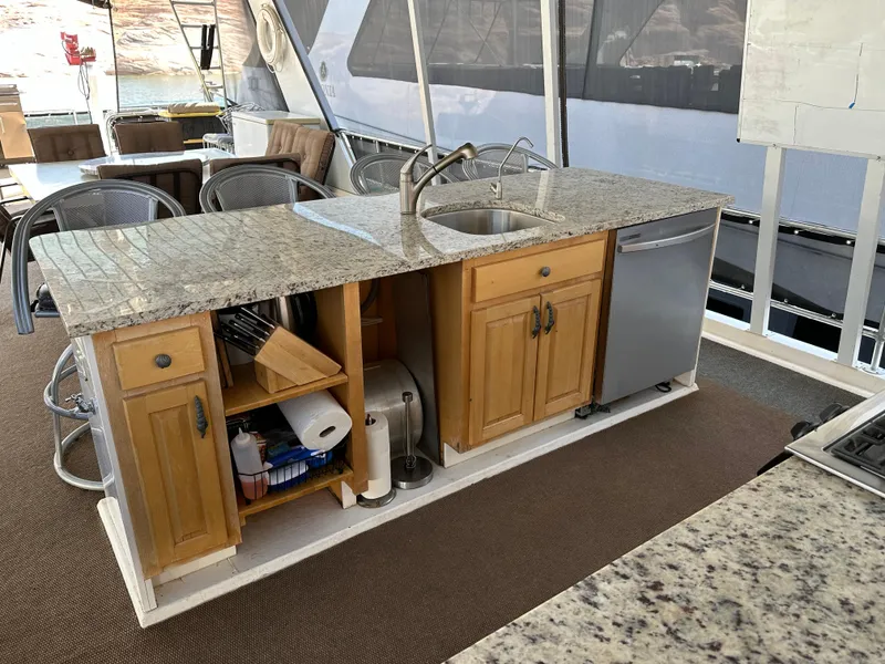 Slide: The Image of Granite countertop kitchen on 2001 Custom Endless Summer boat with sink and dishwasher. - 29