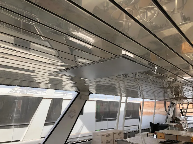 Slide: The Image of Interior view of Custom Endless Summer yacht, 2001 model, featuring sleek ceiling design. - 7