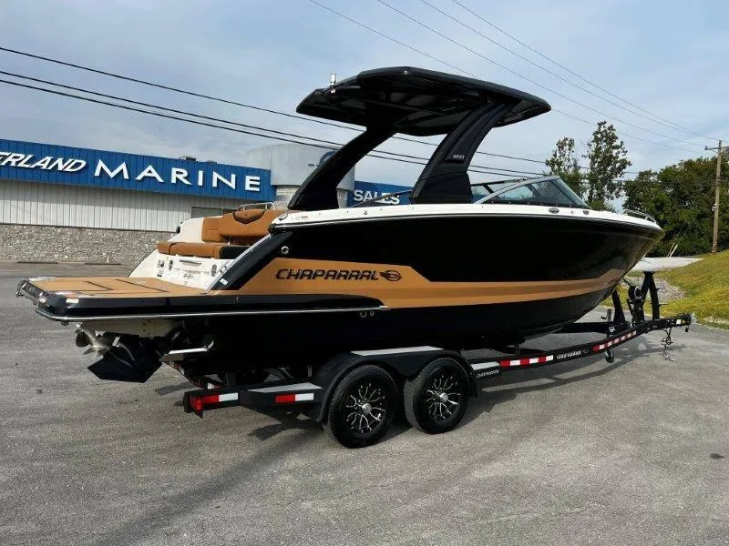 Slide: The Image of 2025 Chaparral 287 SSX boat on trailer at dealership. - 27