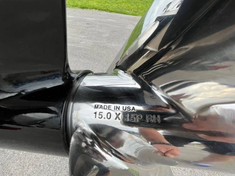 Slide: The Image of Close-up of a 2023 Crest Classic Fish 220 SF boat propeller, marked "Made in USA." - 16