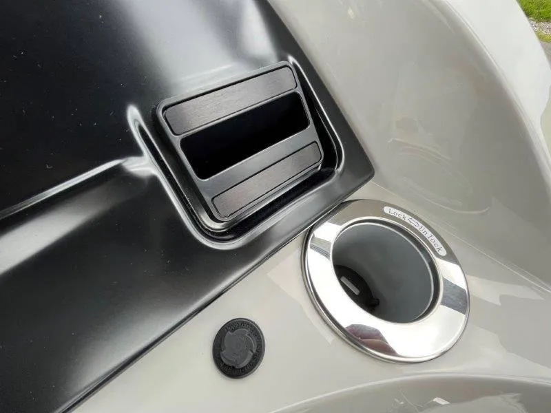 Slide: The Image of Close-up of 2023 Crest Classic Fish 220 SF boat dashboard details. - 26